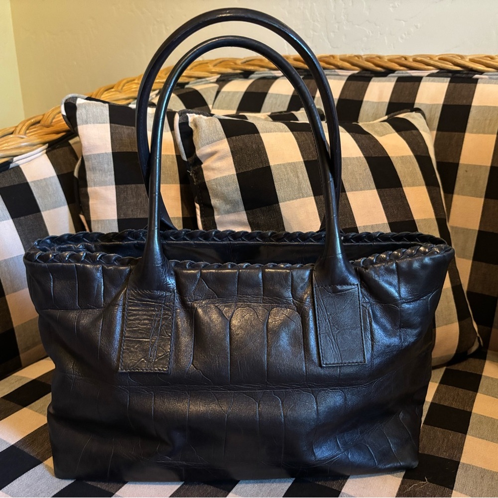 Classic Black Leather Shoulder Bag with Structured Design.  Measures 15”x8”